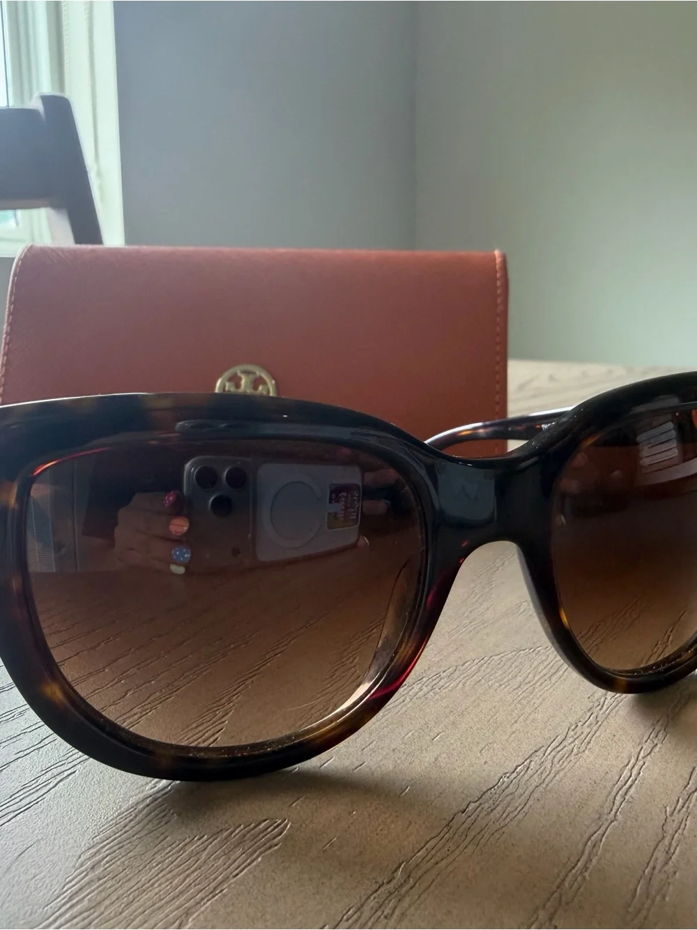 Tory Burch Orange Saffiano Wallet with Black Oversized Sunglasses